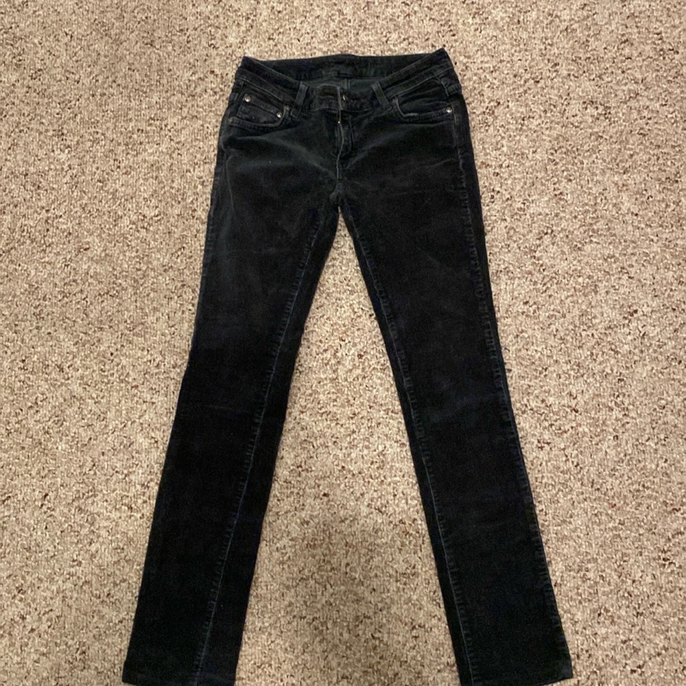Black corduroy skinny pants, size 25S.